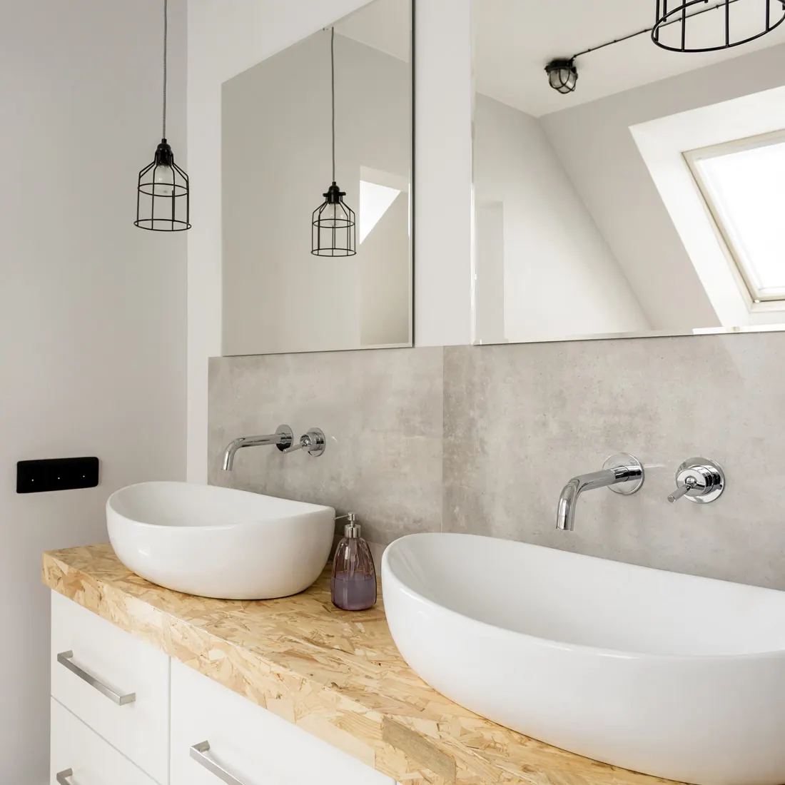 Bathroom renovations in Cardiff with twin countertop basins and wall-mounted taps